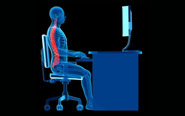 Computer graphic of proper spine alignment when seated at a desk